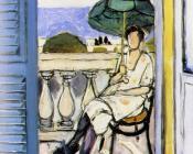 亨利 马蒂斯 : 在阳台上打着绿伞的女人